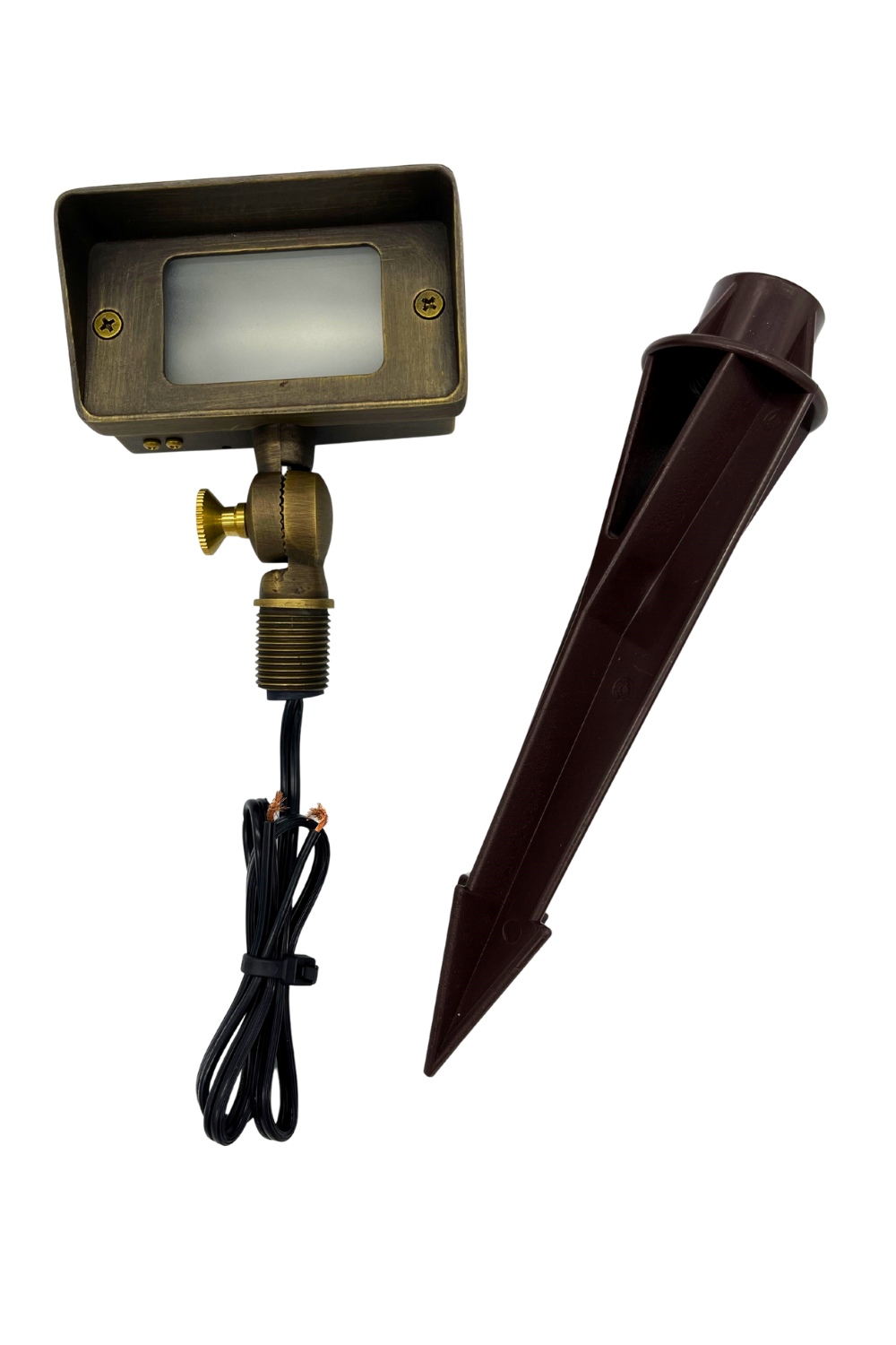 antique brass outdoor wall washer flood light with ground stake installed in landscape